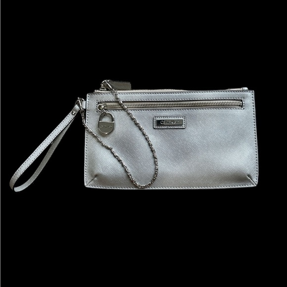 Calvin Klein Silver Zippered Wristlet Excellent Condition - Picture 1 of 2